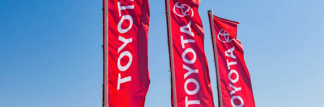 SAMARA, RUSSIA - MAY 29, 2016: Official dealership flags of Toyota against the blue sky background. Toyota Motor Corporation is a Japanese automotive manufacturer